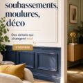 Une pièce avec des soubassements et moulures élégants ajoutant du charme à l'intérieur.